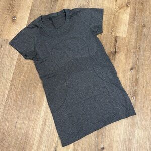 Lululemon swiftly dark gray short sleeve shirt (hip length)